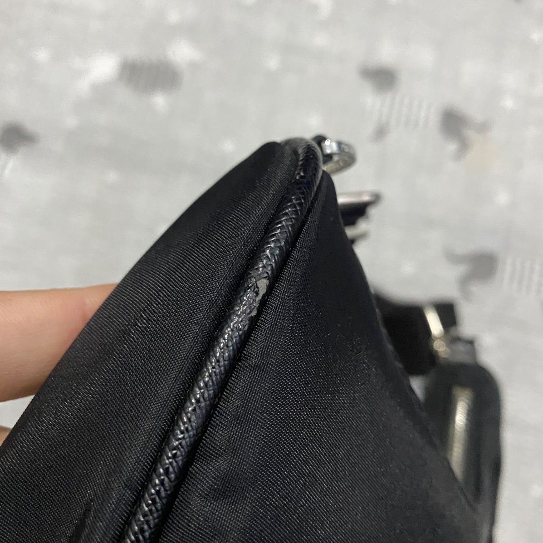 Prada Mini Tessuto Nylon Bag (Category: Luxury Bags & Wallets) located in Antipolo. Submitted by bentakahitanoano (Listing ID 1433684168, Image 3). Description: Prada Re-Edition Mini Nylon Bag Still in good condition. A coveted piece from the Re-Edition series, featuring Prada’s signature durable nylon fabric and the iconic triangular logo. A perfect blend of nostalgia and modern utility. Mini Shoulder Kili Kili Bag Condition. Good used condition