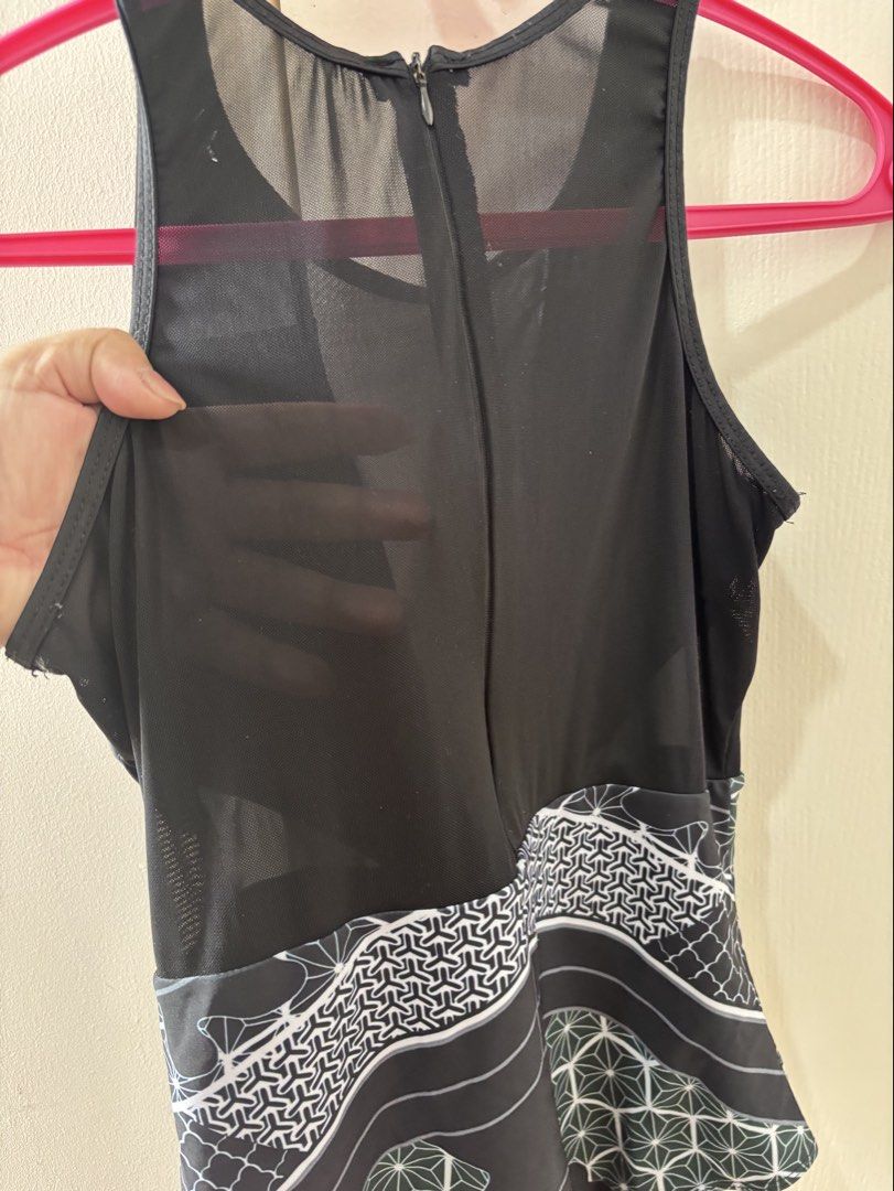 Printed Swimsuit (Category: Bikinis & Swimsuits) located in Caloocan City. Submitted by stuff_shop (Listing ID 1433740977, Image 3). Description: - Unique print - Red and white accents - Mesh front and back panels - Zipper closure - Scoop neck - Comfortable fit.