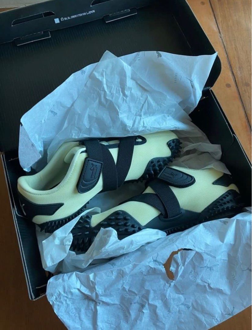 Puma Mostro OG Yellow Black Sneakers (Category: Sneakers) located in Quezon City. Submitted by shopcutepreloved (Listing ID 1433671043, Image 3). Description: - brand new never been used original - comes with original box - original Puma - color: gold moon silver black (pale yellow) - size: EU 36, US 4.5, 22.5cm - with Velcro #puma #mostro #adidas #y2k #viral #trendy #yellow #black #sneakers #nike #reebok.