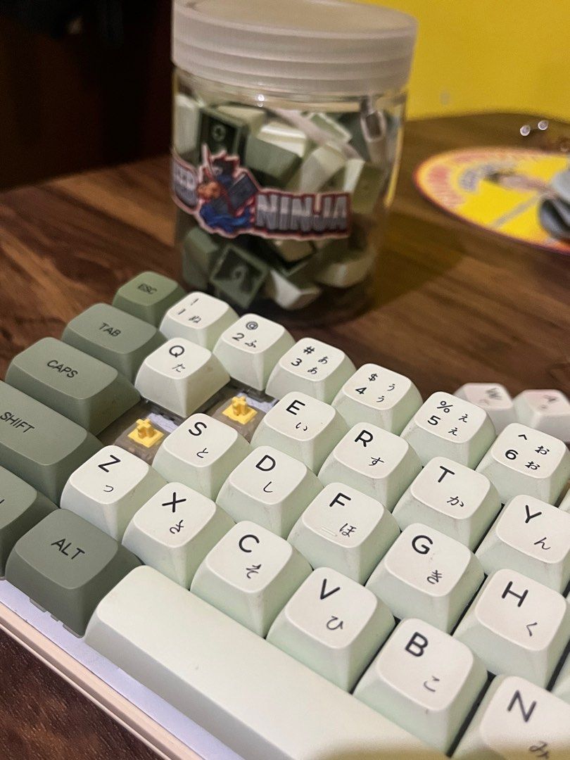 Royal Kludge RKG68 Mechanical Keyboard (Category: Computer Keyboard) located in Valenzuela. Submitted by maryaligaya (Listing ID 1433748387, Image 2). Description: - tri-mode (wifi, bluetooth, wired) - yellow switches, modded/lubed - japanese matcha boba themed not the first owner, just got it recently from the original owner. rfs: hindi pala magagamit, at walang mapaggagamitan .