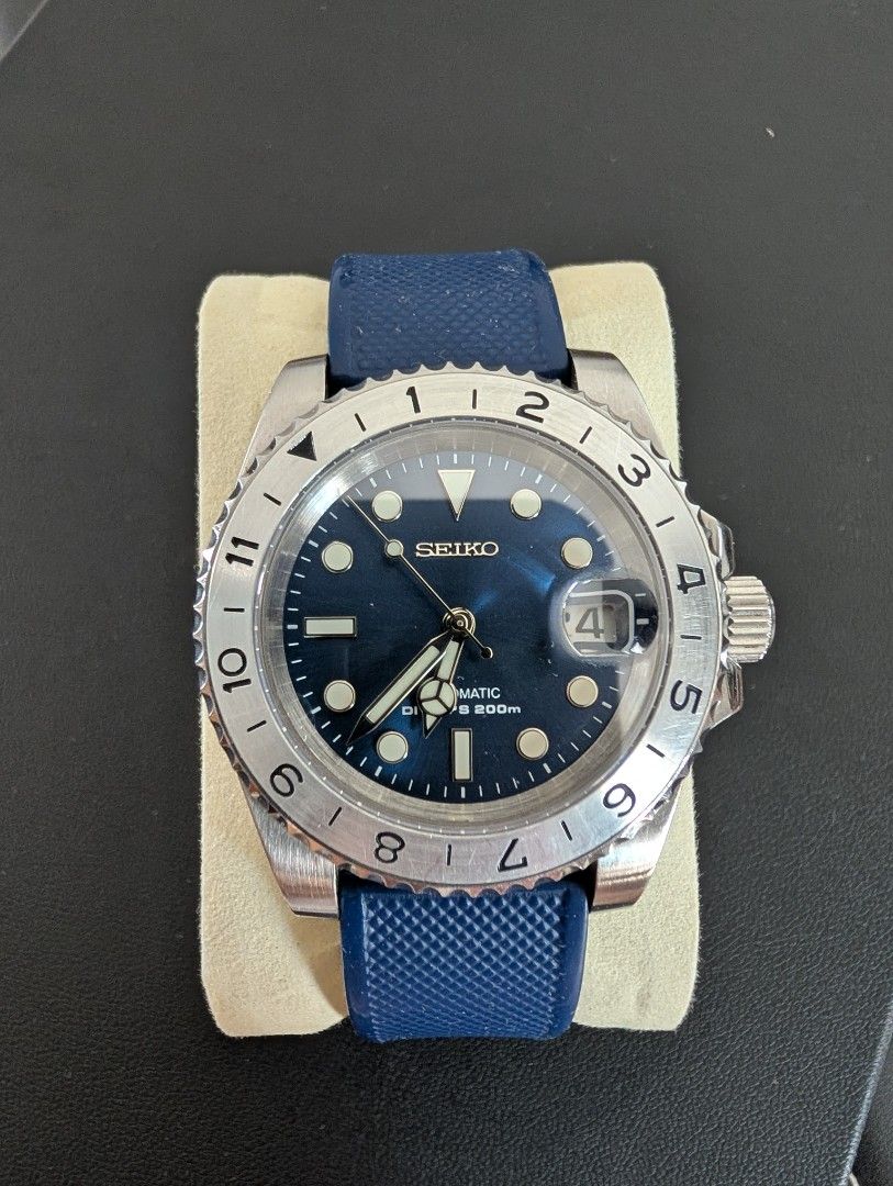 Seiko Mod (Category: Men's Watches) located in Las Pinas. Submitted by carl000000 (Listing ID 1433620688, Image 1). Description: Seiko Submariner Mod Movement: Seiko NH36 Case Diameter: 40mm Strap: 20mm Barton Rubber Strap (will include original metal strap) Sapphire Crystal Additional mod: Exhibition case back and blue rotor.