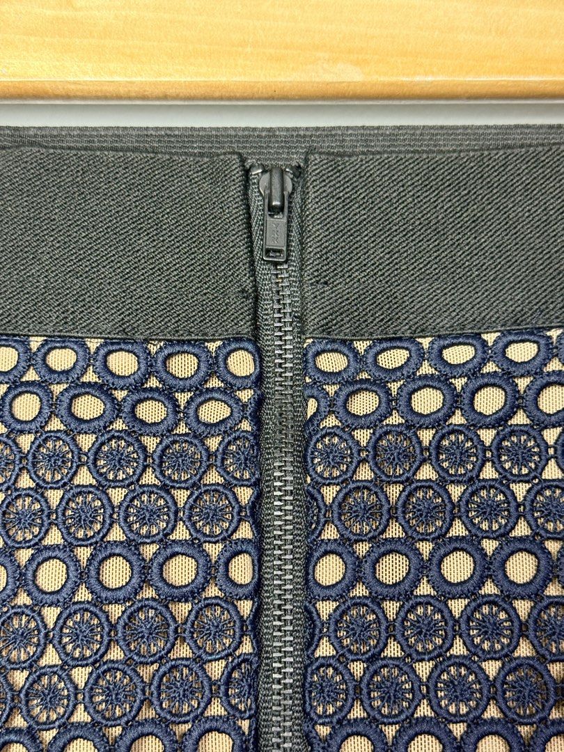 Self-Portrait Navy Lace Skirt (Category: Skirts) located in Manila. Submitted by dipdrip (Listing ID 1433735394, Image 3). Description: - Self-Portrait navy lace skirt - Flattering A-line silhouette - Intricate floral and geometric lace detailing - Hidden zipper closure - Convenient pockets - Nude-colored lining - Size: UK 14, US 10 DIMENSION Waist : 28 Length : 26 Condition In excellent condition 2,500php Negotiable Open for COD via Lalamove aro