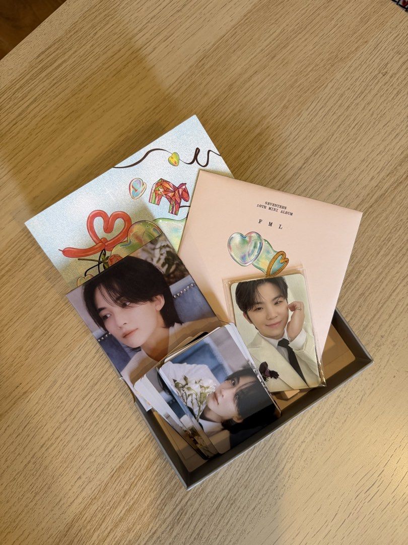 Seventeen FML 10th Mini Album UNSEALED (Category: K-Wave Merchandise) located in Quezon City. Submitted by rochichan (Listing ID 1433642559, Image 2). Description: - Seventeen FML 10th Mini Album - Includes album, photocards, and other inclusions - Features a bubble-themed album cover - Photo cards with member images - Album is in original packaging.