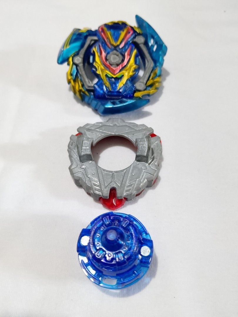 Slash Valkyrie Blitz Power Retsu (B-134), a Right-Spin Attack Type Beyblade from the Beyblade Burst GT series (Category: Action & Battle Toys) located in Victoria. Submitted by oseisan10249776 (Listing ID 1433590584, Image 3). Description: 799 each Gatinko Chip (Valkyrie): Features the iconic Valkyrie avatar, providing strong teeth for burst resistance. Layer Weight (Retsu): An unbalanced weight that concentrates most of its mass on one side to i
