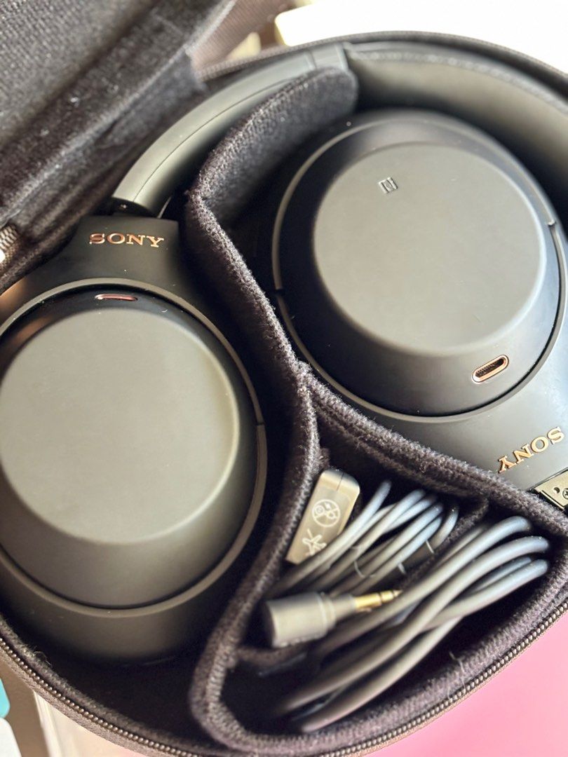 Sony XM4 Headphones (Category: Headphones & Headsets) located in Makati City. Submitted by vermeernhopper (Listing ID 1433402950, Image 2). Description: ♫₊˚.🎧 GREAT NOISE-CANCELLING HEADPHONES! Bought in 2022 and mainly used for studying and traveling (especially flights ✈️), so still in good condition and well taken care of. INCLUSIONS ✮ Original case, but no box ✮ Airplane adapter ✮ Charging cord (not original; no plug included) CONDITION ✮ Fu