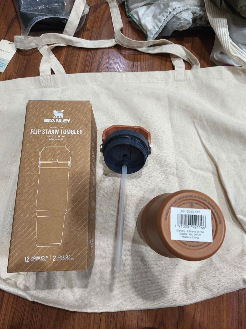 Stanley Flip Straw Tumbler 2.0 30oz (Category: Water Bottles & Tumblers) located in Quezon City. Submitted by jhays02 (Listing ID 1433700145, Image 2). Description: - Stanley Flip Straw Tumbler (30oz) in brown - Features a convenient flip straw lid and handle - Comes with the original box - Purchased from Chris Sports - Keeps drinks cold for 12 hours - Keeps drinks iced for 2 days.