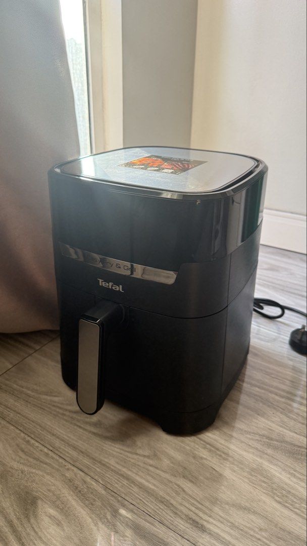 Tefal Easy Fry & Grill Precision 2-in-1 (Category: Cookware & Accessories) located in Makati City. Submitted by miranda.dy (Listing ID 1433680822, Image 2). Description: - Tefal Easy Fry & Grill Precision Air Fryer - 2-in-1: Air Fry and Grill - 4.2L Capacity - Healthy cooking with little to no oil - Includes basket and components Bought in Amazon Orig price Php 14k .