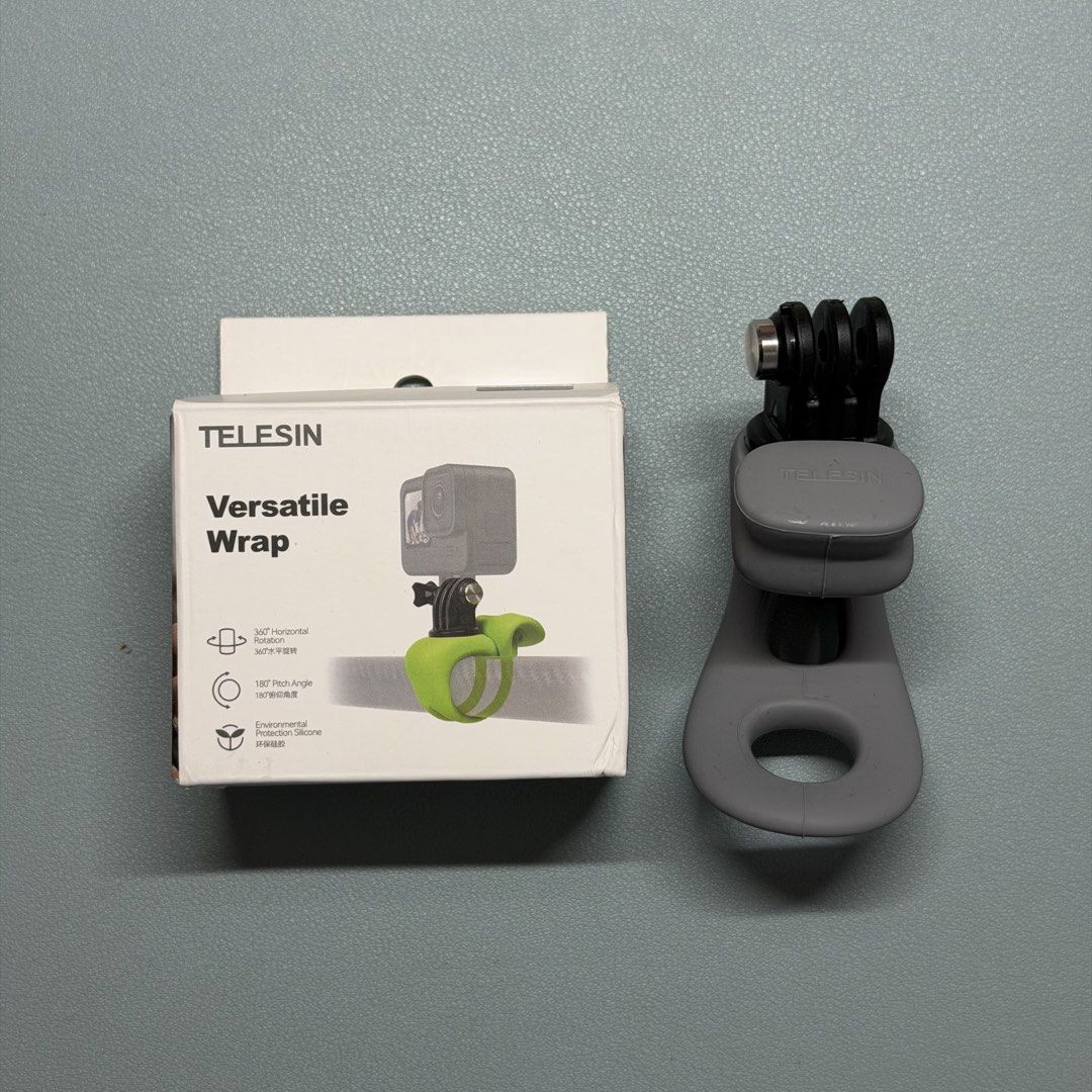 TELESIN Versatile Wrap Action Camera Mount (Category: Other Photography Accessories) located in Valenzuela. Submitted by declutterwithmrll (Listing ID 1433771168, Image 1). Description: TELESIN Small-Q Silicone Ring Elastic Handlebar Mount Action Cameras Compatible with GoPro Hero, DJI Osmo, Insta360, SJCAM etc TLQ-001 - TELESIN Versatile Wrap camera mount - Includes: - Gray wrap with bottom loop - Screw - Black GoPro mount - Features: - 360-degr