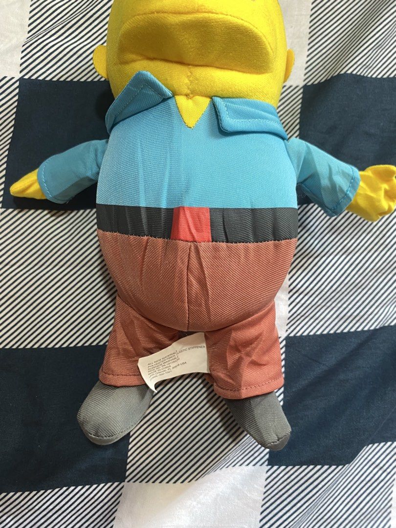 The Simpsons Ralph Wiggum Plush Toy (Category: Plushies & Soft Toys) located in Kalibo. Submitted by ollie_stuffshop (Listing ID 1433648344, Image 3). Description: H: 32 cm, W: 14 cm Before you send your inquiries: ❗️Last Price is already posted ❗️Manage your expectations, WYSIWYG ❗️Some may need washing - Ralph Wiggum plush toy - From The Simpsons - Features Ralph's signature outfit - Includes blue shirt, brown pants, and gray shoes - Yellow ski