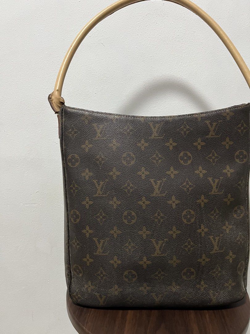 Vintage Louis Vuitton Leather Hand Bag (Authentic) (Category: Luxury Bags & Wallets) located in Calamba. Submitted by jim.ibe066 (Listing ID 1433710834, Image 3). Description: Vintage Louis Vuitton Leather Hand Bags (Authentic) Very good condition 9/10 condition and color rate -Serial Coded -Complete Tag -Leather Material -Still in good condition see leather, no any cracks or stains -I bought this one in Japan 2nd hand store still in good conditi