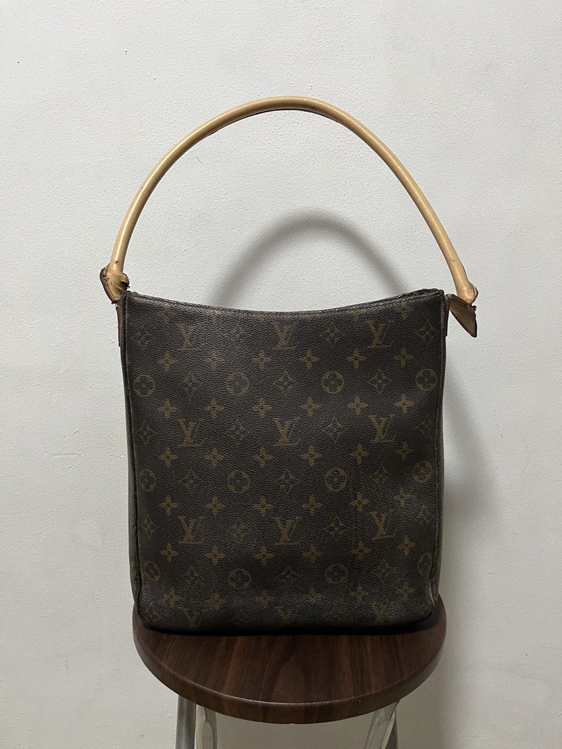Vintage Louis Vuitton Leather Hand Bag (Authentic) (Category: Luxury Bags & Wallets) located in Calamba. Submitted by jim.ibe066 (Listing ID 1433710834, Image 1). Description: Vintage Louis Vuitton Leather Hand Bags (Authentic) Very good condition 9/10 condition and color rate -Serial Coded -Complete Tag -Leather Material -Still in good condition see leather, no any cracks or stains -I bought this one in Japan 2nd hand store still in good conditi