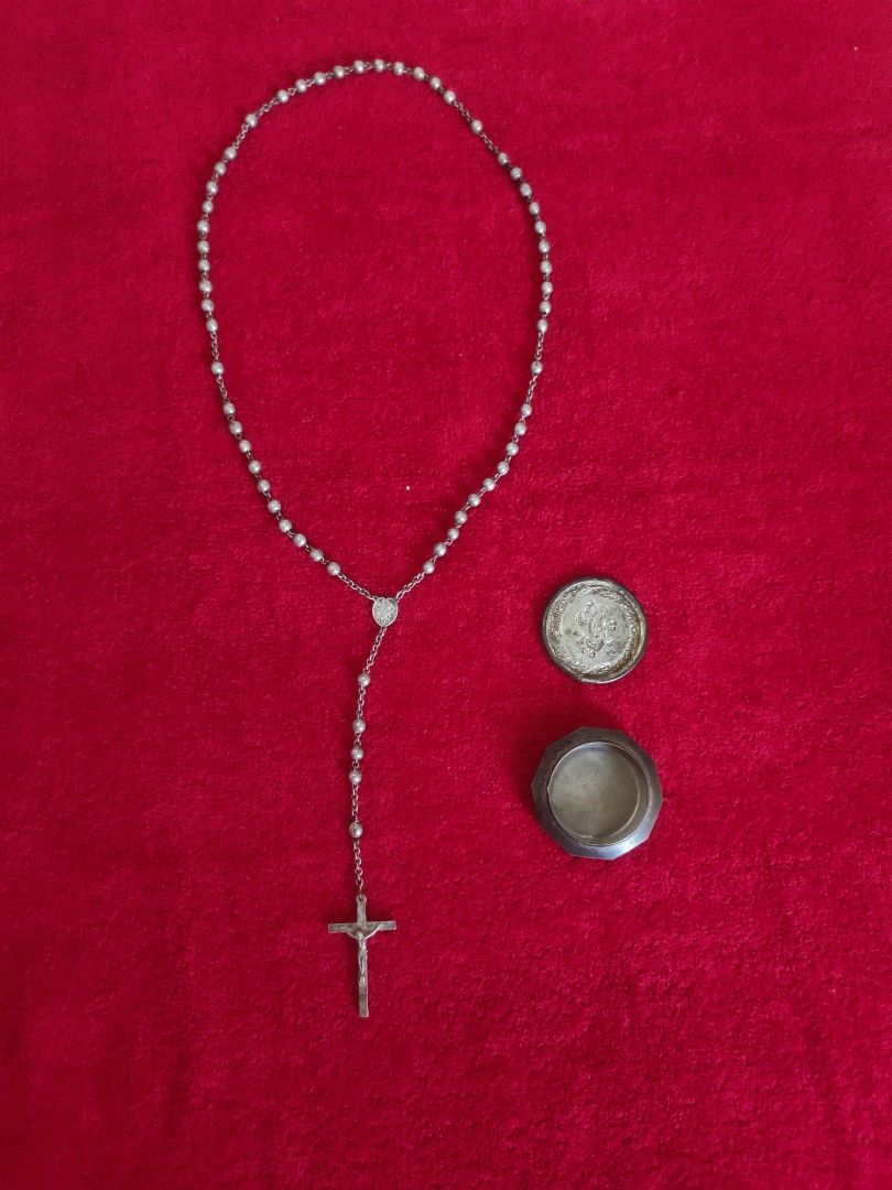 Vintage Rosary with Cross (Category: Religious Items) located in Imus. Submitted by jane369 (Listing ID 1433613544, Image 1). Description: - Vintage silver rosary - Features a detailed cross pendant - Small, round beads - Includes a small container - Ideal for personal use or collection -made in Italy (embossed in the cross) Marian Monogram the interwined letters A and M short for Ave Maria (Hail Mary) or Maria for the Virgin Mary It is very old,