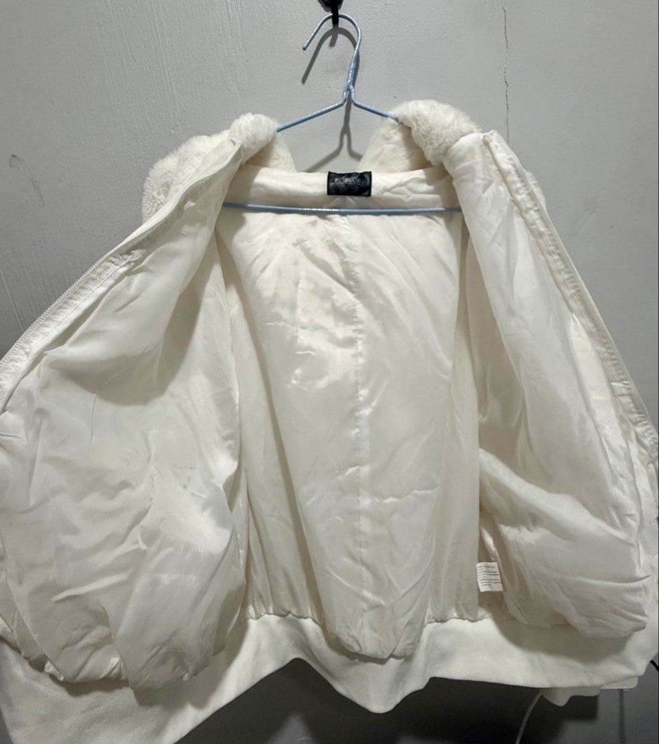 White Fur Hooded Fleece Jacket (Plus-size) (Category: Coats, Jackets and Outerwear) located in San Pedro. Submitted by me-shops (Listing ID 1433695619, Image 3). Description: White faux fur jacket Size: Fits XXL - Hooded - Full zip closure - Soft, fluffy texture - Satin-like lining - Bomber-style hem and cuffs - Warm and suitable for cooler weather.
