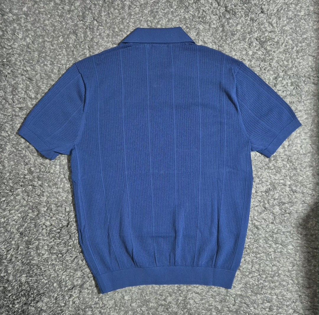 Wilson X Kith Collab Cable Johnny Collar Polo (Blue) (Category: Tshirts & Polo Shirts) located in Singapore. Submitted by keem_clearingout (Listing ID 1433727553, Image 2). Description: Kith for Wilson Cable Johnny Collar Polo (Blue) ✔ Size: XS (fits like S–M) ✔ Colour: Blue Quartz ✔ Collection: Kith x Wilson SS23 (limited release) 🔥 Premium cable-knit polo with Johnny collar design 🔥 Lightweight, breathable knit – suitable for casual or smart 