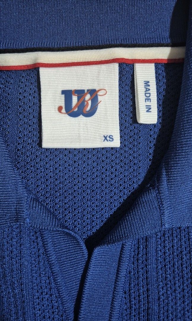 Wilson X Kith Collab Cable Johnny Collar Polo (Blue) (Category: Tshirts & Polo Shirts) located in Singapore. Submitted by keem_clearingout (Listing ID 1433727553, Image 3). Description: Kith for Wilson Cable Johnny Collar Polo (Blue) ✔ Size: XS (fits like S–M) ✔ Colour: Blue Quartz ✔ Collection: Kith x Wilson SS23 (limited release) 🔥 Premium cable-knit polo with Johnny collar design 🔥 Lightweight, breathable knit – suitable for casual or smart 