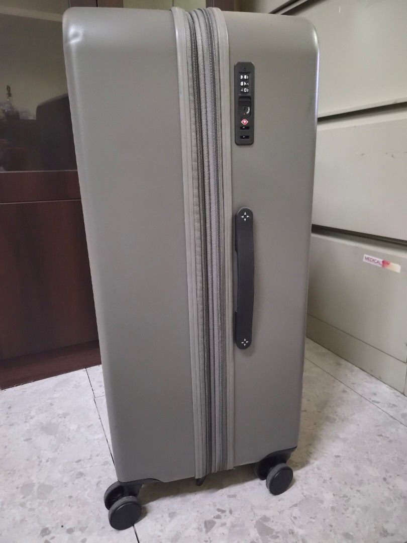 World Traveller -Grey Suitcase (Large) (Category: Luggage) located in Las Pinas. Submitted by ajbash (Listing ID 1433664730, Image 2). Description: - 8/10 condition -Large Width 20 Length 27.5 Thickness 12.5 -With minimal dents & sticker marks.