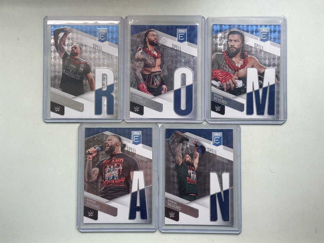 WWE Roman Reigns Elite Spellbound Complete Set Cards (Category: Raw Singles) located in Manila. Submitted by clamchowder19 (Listing ID 1433666257, Image 1). Description: - WWE Roman Reigns Elite Spell Out Cards - Features cards that spell out "ROMAN" - Showcases images of Roman Reigns - Includes career information on the card backs - From the 2023 Panini WWE Elite series.