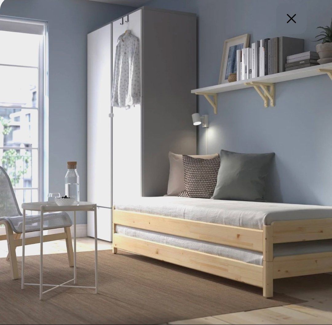 X2 stackable bed frames with mattresses (Category: Bed Frames & Mattresses) located in Singapore. Submitted by frenchymila (Listing ID 1433727353, Image 2). Description: Pick up 399939 - Converts to single or double bed - Made of solid wood - Sturdy and stylish design - Perfect for guest rooms or small spaces - Mattress not included $150 each (including mattress).