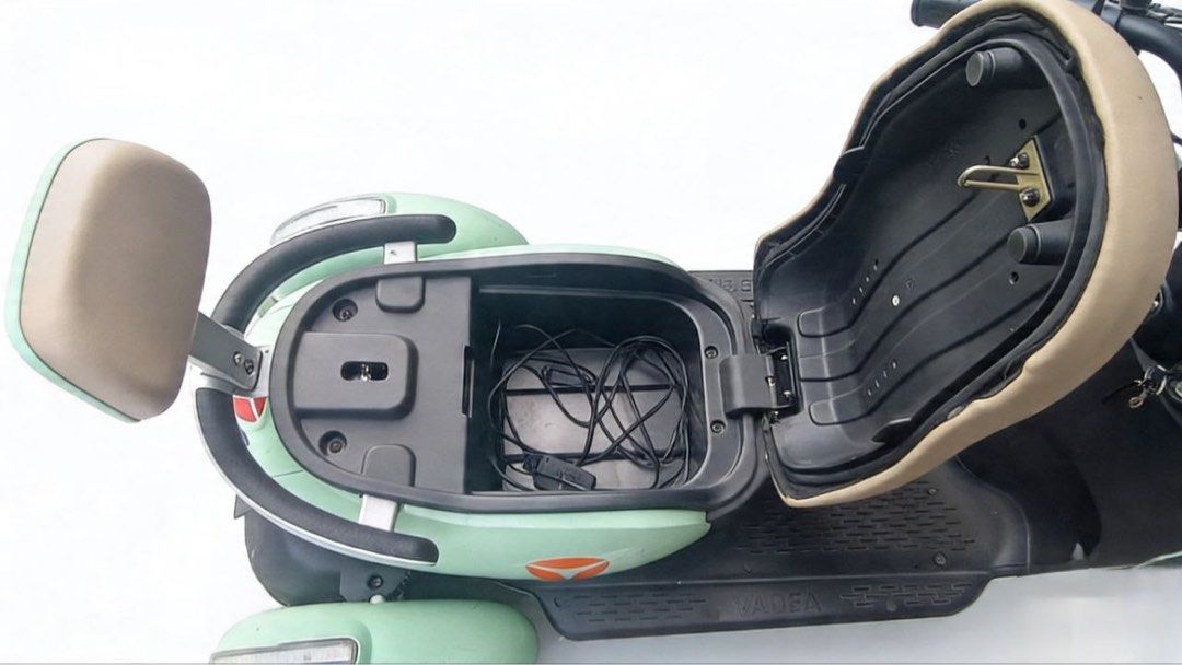 Yadea Electric Scooter 3 wheel (Category: Skates, Rollerblades & Scooters) located in Manila. Submitted by smarket720 (Listing ID 1433625711, Image 3). Description: - Mint green Yadea electric scooter - Two-tone seat and backrest - Includes side mirrors - Front headlight - Features Yadea logo - Black footrest area With receipt - Minor scratches present.