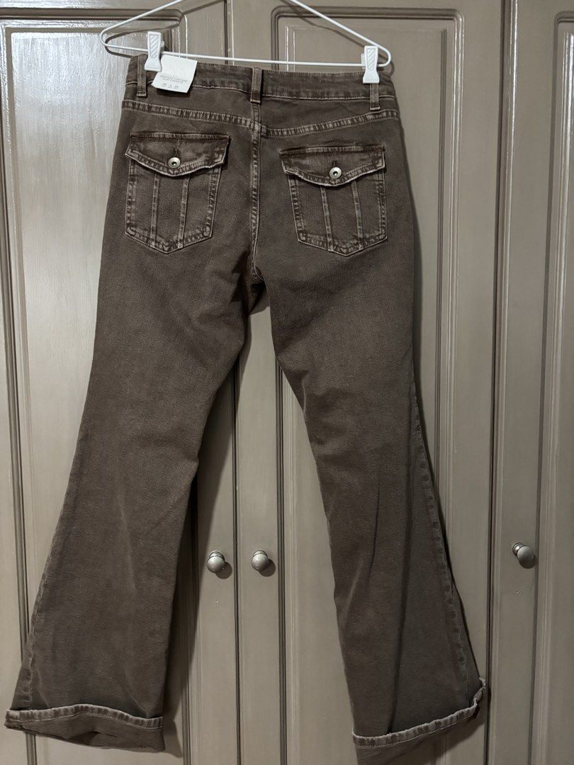 Zara Bootcut Low Rise Flap Pockets Jeans (Category: Jeans) located in Quezon City. Submitted by ada_412 (Listing ID 1433623101, Image 2). Description: - Zara brown bootcut jeans - Low rise - Features flap pockets - Size: 36 EUR / 4 USA / 26 MEX - Regular length - Raw hem detail - New with tags.
