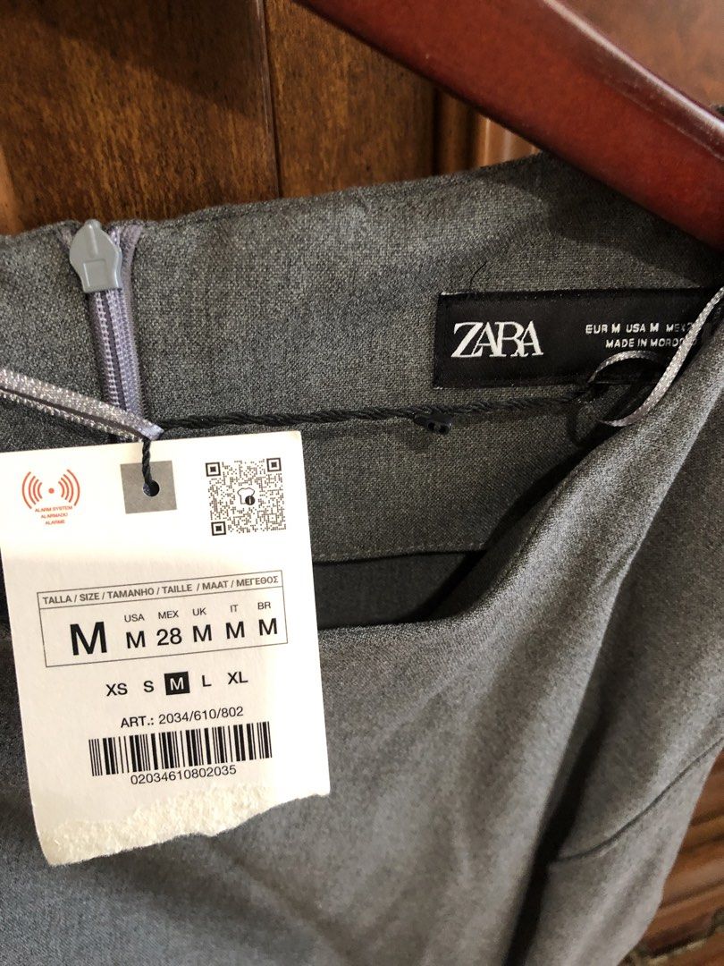 Zara Sleeveless Dress - Size M (Category: Dresses) located in Davao. Submitted by stylecircuit (Listing ID 1433600110, Image 3). Description: - Zara sleeveless dress - Color: Gray - Features ruched detail - Slit at hem - Back zipper closure - Size: M - Made in Morocco.