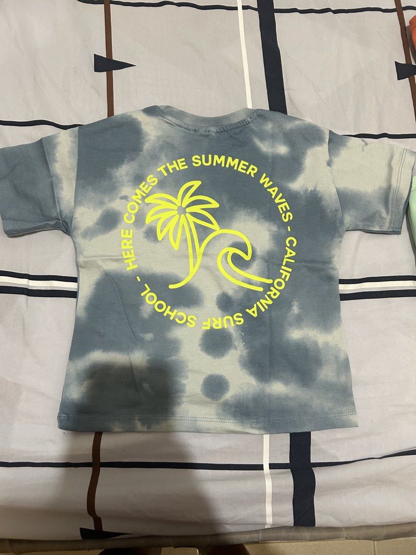 Zara Tie-dye Summer Waves Tshirt Kids (Category: Babies & Kids Fashion) located in Quezon City. Submitted by wonderrv18 (Listing ID 1433673811, Image 2). Description: - Zara tie-dye t-shirt - Unique palm tree and wave graphic - Back graphic: "Here comes the summer waves - California surf school" - Short sleeves - Crew neck - Ideal for a casual, summery look.
