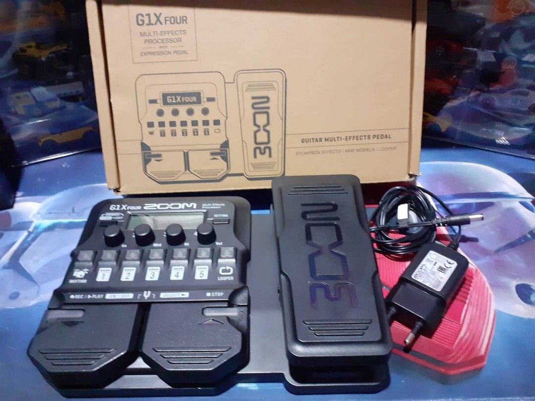 ZOOM G1X FOUR Guitar Multi Effects Pedal (Category: Musical Instruments) located in Kawit. Submitted by clyde_cassie.closet (Listing ID 1433586181, Image 1). Description: ZOOM G1X FOUR Guitar Multi Effects Pedal with adaptor– Brand new Condition Selling my son's Zoom G1X Four multi-effects pedal -with original box and free Zoom AC Adapter AD-16E Used a little bit and well maintained. All functions and knobs working perfectly, no issues. Great ton
