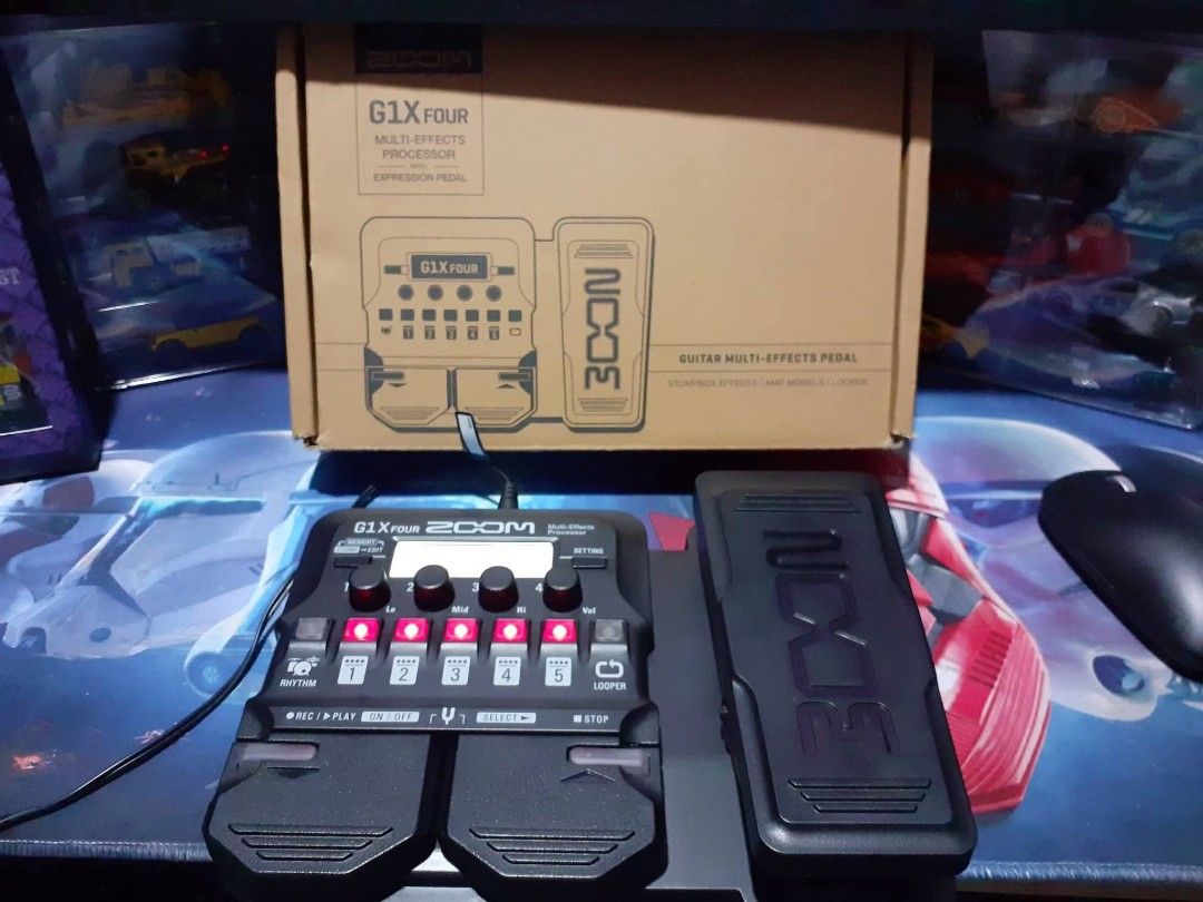 ZOOM G1X FOUR Guitar Multi Effects Pedal (Category: Musical Instruments) located in Kawit. Submitted by clyde_cassie.closet (Listing ID 1433586181, Image 2). Description: ZOOM G1X FOUR Guitar Multi Effects Pedal with adaptor– Brand new Condition Selling my son's Zoom G1X Four multi-effects pedal -with original box and free Zoom AC Adapter AD-16E Used a little bit and well maintained. All functions and knobs working perfectly, no issues. Great ton