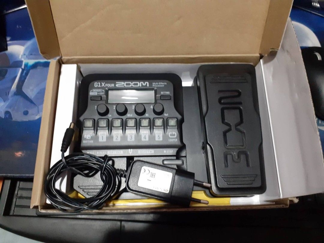 ZOOM G1X FOUR Guitar Multi Effects Pedal (Category: Musical Instruments) located in Kawit. Submitted by clyde_cassie.closet (Listing ID 1433586181, Image 3). Description: ZOOM G1X FOUR Guitar Multi Effects Pedal with adaptor– Brand new Condition Selling my son's Zoom G1X Four multi-effects pedal -with original box and free Zoom AC Adapter AD-16E Used a little bit and well maintained. All functions and knobs working perfectly, no issues. Great ton