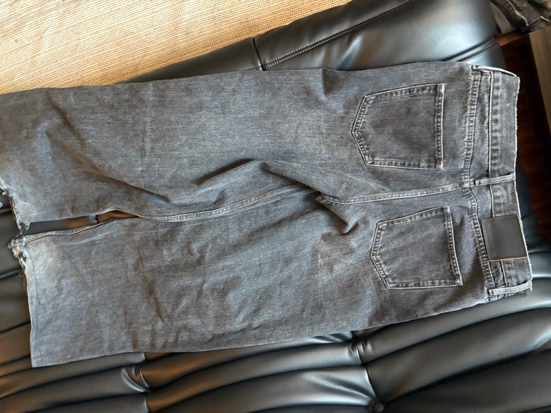 Acne Studios Black Jeans (Category: Jeans) located in Quezon City. Submitted by nmuy05 (Listing ID 1433854652, Image 3). Description: - Acne Studios black jeans - Size: 46 - Straight leg fit - Button fly closure - Raw hem - Two back pockets - Leather Acne Studios logo patch - Denim material.