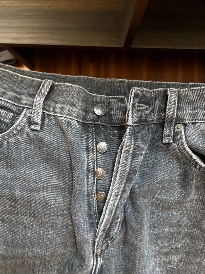 Acne Studios Black Jeans (Category: Jeans) located in Quezon City. Submitted by nmuy05 (Listing ID 1433854652, Image 2). Description: - Acne Studios black jeans - Size: 46 - Straight leg fit - Button fly closure - Raw hem - Two back pockets - Leather Acne Studios logo patch - Denim material.