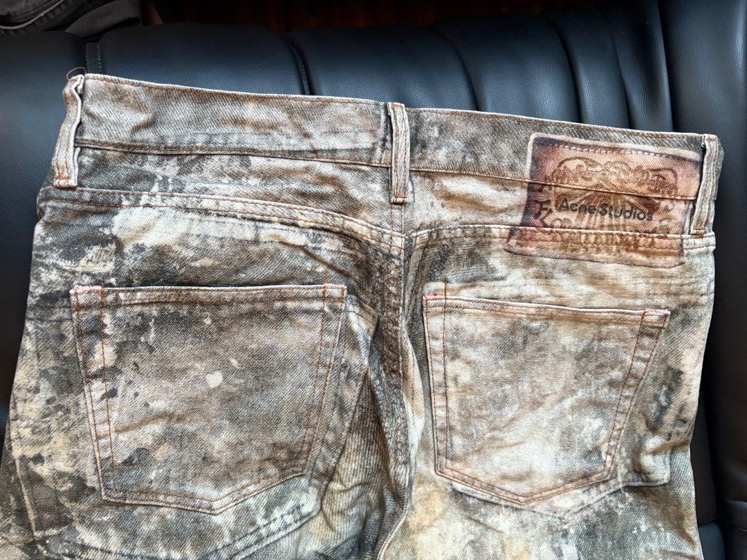 Acne Studios oil splatter jeans (Category: Jeans) located in Quezon City. Submitted by nmuy05 (Listing ID 1433855024, Image 3). Description: - Acne Studios jeans - Distressed design - Button fly - Classic five-pocket style - Leather Acne Studios logo patch - Size: EUR 48 - Material: 100% cotton.