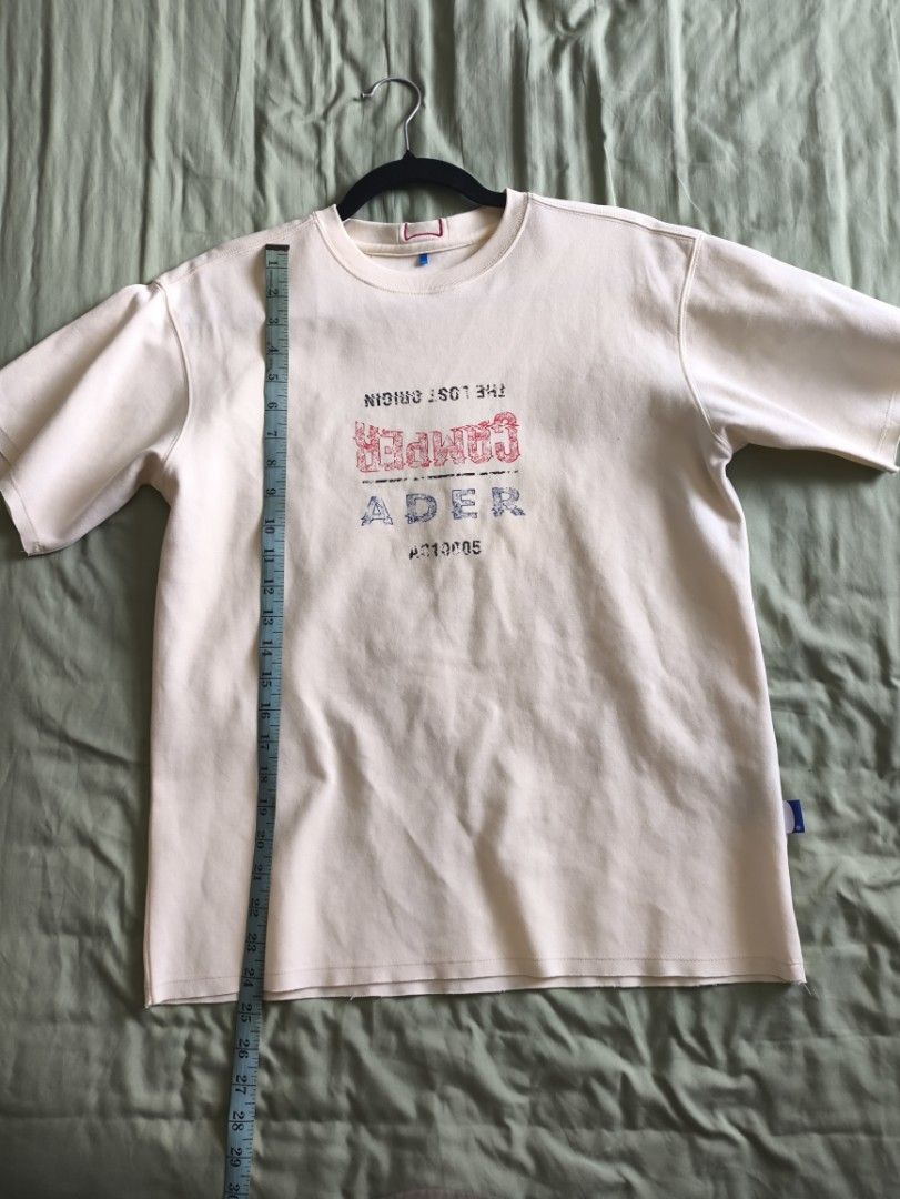 Ader Error x Camper T-shirt (Category: Tshirts & Polo Shirts ) located in Pavia. Submitted by deusk (Listing ID 1433811873, Image 3). Description: - Ader Error x Camper T-shirt - Color: Cream - Size: A1 - Design: Graphic print on front - Material: 100% Cotton.