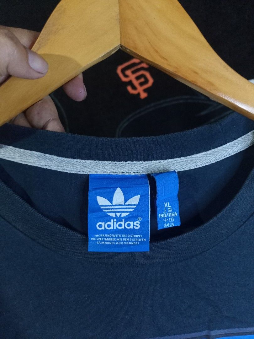Adidas Big Print T-shirt (Category: Tshirts & Polo Shirts ) located in Castilla. Submitted by stignapamorma (Listing ID 1433898681, Image 2). Description: Branded Tshirt ( Ukay x Thrifted ) Blurred Logo Size - 23x30 Condition - Excellent Color Rate - 9/10 Issue - None Price - 350+SF.