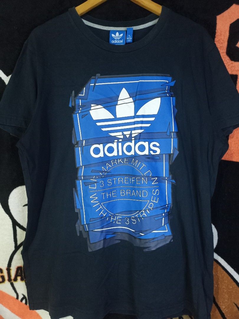 Adidas Big Print T-shirt (Category: Tshirts & Polo Shirts ) located in Castilla. Submitted by stignapamorma (Listing ID 1433898681, Image 1). Description: Branded Tshirt ( Ukay x Thrifted ) Blurred Logo Size - 23x30 Condition - Excellent Color Rate - 9/10 Issue - None Price - 350+SF.