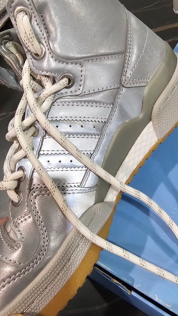 Adidas Ivy Park Forum Mid Silver (Category: Sneakers) located in Pasig City. Submitted by wellwellwellph (Listing ID 1433859725, Image 2). Description: - Adidas Ivy Park Forum Mid [used once] - Silver colorway - Features Ivy Park strap - White laces - Gum sole - Size: US 5.5 - Includes original box.