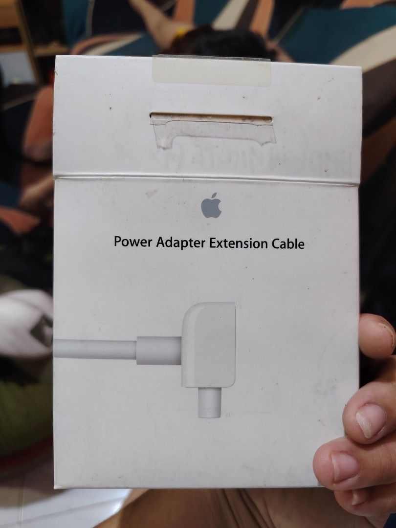 Apple Power Adapter Extension Cable (Category: Cables & Adaptors) located in Taguig. Submitted by nhess.28 (Listing ID 1433906373, Image 1). Description: - Genuine Apple Power Adapter Extension Cable - Extends the reach of your Apple power adapter - Compatible with various Apple devices - Color: White - Comes in original packaging.