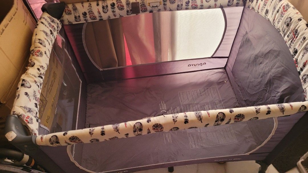 Apruva Playpen / Crib can be Rocked (Category: Infant Playtime) located in Pasig City. Submitted by twix.declutters (Listing ID 1433850435, Image 1). Description: - Apruva crib playpen for babies. - Mesh design for visibility and airflow. - Soft, patterned fabric sides. - Easy setup and fold-down for storage. - Neutral color suitable for any gender.
