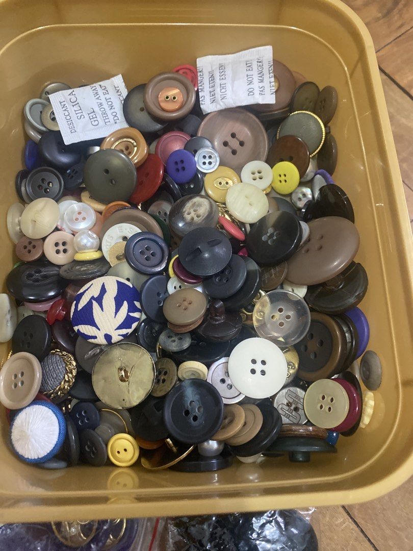 Assorted Buttons - Various Sizes and Styles (Category: Craft Supplies & Tools) located in Marikina City. Submitted by lay_away_ok (Listing ID 1433802783, Image 2). Description: - Assorted buttons in various sizes, colors, and styles. - Includes black, gold, silver, and pearl-like buttons. - Styles: Round, flower-shaped, and decorative designs. - Perfect for sewing, crafts, and adding a unique touch to clothing. - Some buttons in plastic bags, oth