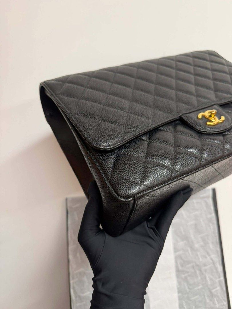 Authentic Chanel Classi Maxi Caviar Single flap (Category: Luxury Bags & Wallets) located in Quezon City. Submitted by jhaediah (Listing ID 1379076729, Image 3). Description: Classic Maxi single flap 34cm Black Caviar GHW 14holo With card and dust bag Hk pasbuy ♥️4.23.16.