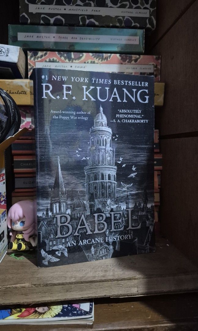 Babel by RF Kuang (Category: Storybooks) located in Cavite. Submitted by biblioartist50495 (Listing ID 1433796660, Image 1). Description: Never read. Available for meet at One Ayala Every tuesday or Cavite City Area. Can ship through J&T. -With plastic cover from Fully Booked.