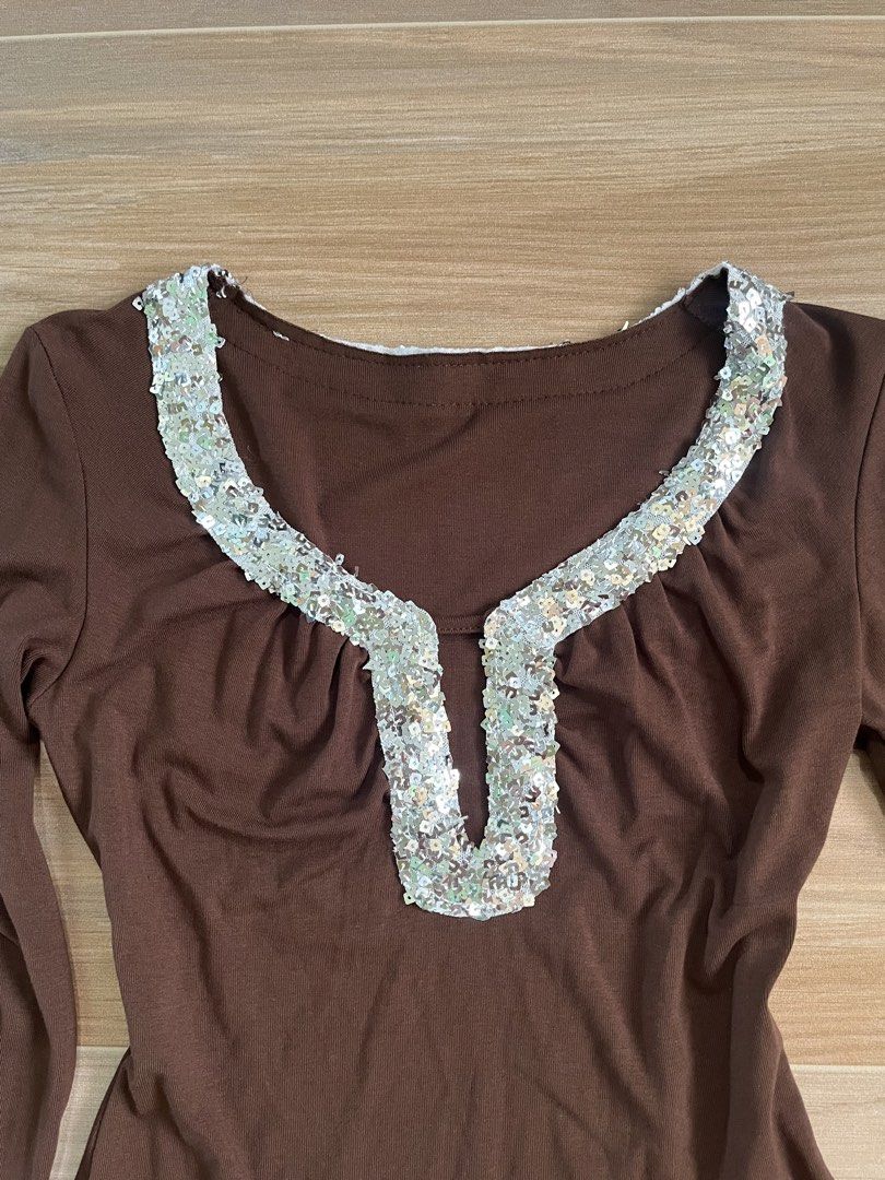 beaded sparkling top (Category: Longsleeves) located in Pasay City. Submitted by cshell_sells (Listing ID 1433887609, Image 2). Description: - size small to medium - length 18in - waist 25in - no issue/s - sf to be covered by the buyer.