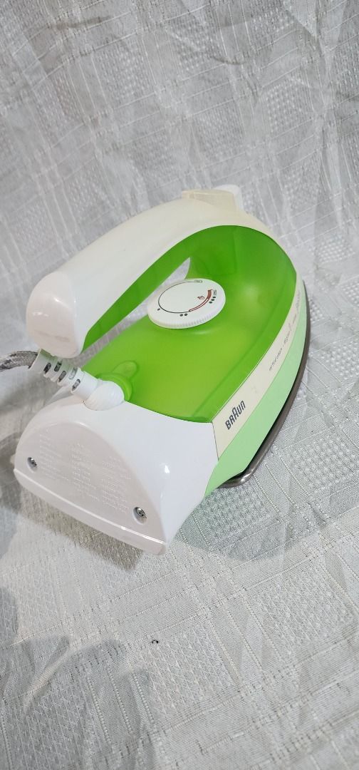 Braun Steam Iron made in Spain (Category: Irons & Steamers) located in Baguio. Submitted by coffeesilvershadow_28 (Listing ID 1433954936, Image 2). Description: - Second hand item from HK box- With signs of usage but still in good condition - Issue lang nya sa cord (natastas tahi) as seen in the picture pero working well naman po and still in good condition - Made in Spain - No box included - 250V - Baguio City dropping - Jnt shipping- payment fi