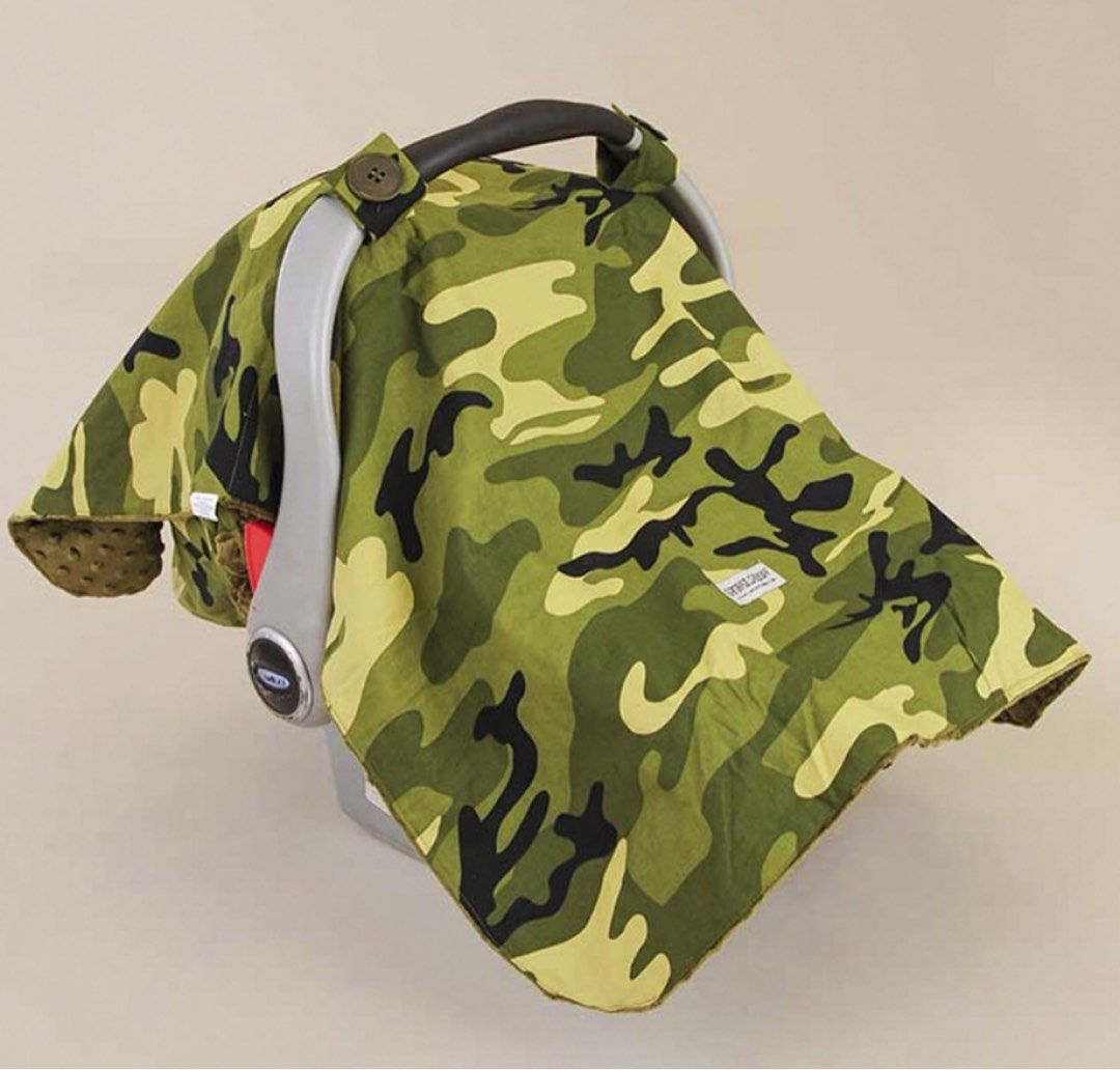 Camouflage Car Seat Cover (Category: Car Seats) located in Paranaque City. Submitted by allthatclutterph (Listing ID 1433906931, Image 1). Description: - Green camouflage design - Soft, textured interior - Button closures for secure fit - Designed for car seat protection from the sun/light - Thick material Www.carseatcanopy.com.