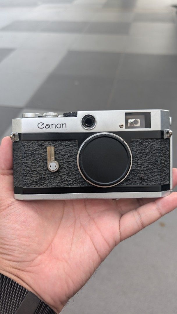 Canon P (Category: Cameras) located in Quezon City. Submitted by mjrivera19 (Listing ID 1433871689, Image 1). Description: Canon P - all functions are working properly issues: - body has scratches - film gate has wrinkles - RF patch isn't that contrasty but still usable.