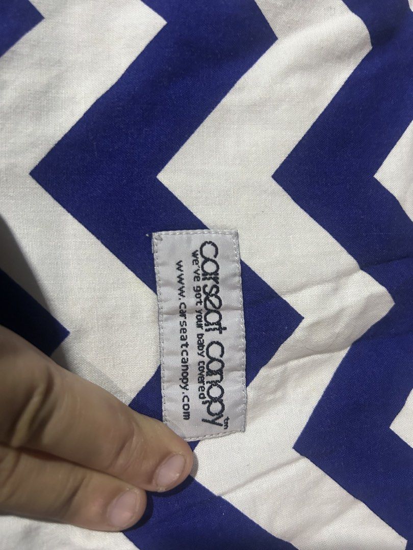 Car Seat Canopy - Blue Chevron (Category: Car Seats) located in Paranaque City. Submitted by allthatclutterph (Listing ID 1433907492, Image 3). Description: - Stylish blue and white chevron pattern - Designed to cover a car seat - Provides shade and protection - Made by Carseat Canopy - Soft and durable fabric - Soft, textured interior - Button closures for secure fit - Designed for car seat protection from the sun/light - Thick material Www.cars