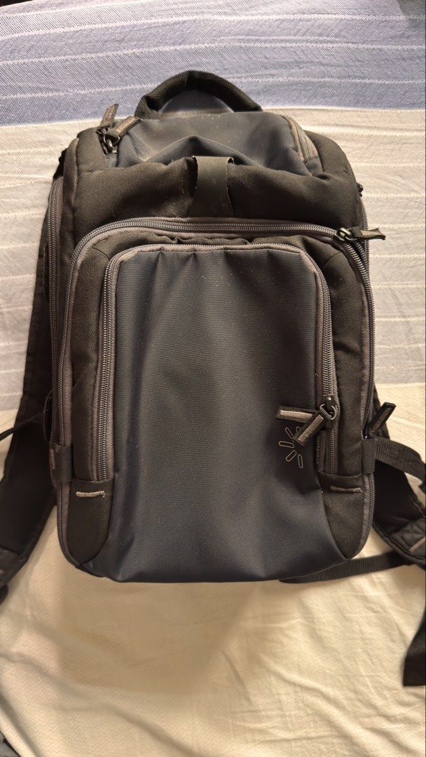 Case Logic Camera Backpack (Category: Camera Bags & Carriers) located in Singapore. Submitted by Derhoho (Listing ID 1433909023, Image 1). Description: - Case Logic camera backpack - Perfect for photographers - Multiple compartments for gear - Padded dividers for protection - Comfortable back panel - Adjustable straps - Fully functional.