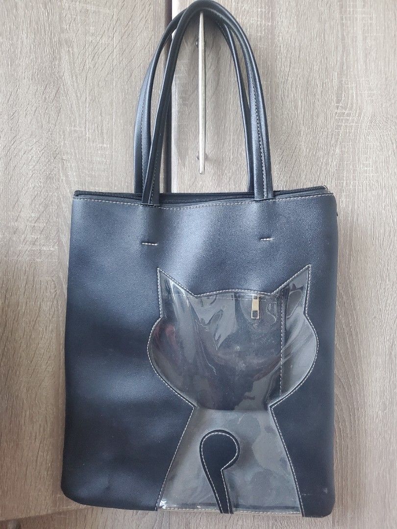Cat Tote Bag (Category: Shoulder Bags) located in Cavite. Submitted by sameoreo (Listing ID 1433824717, Image 1). Description: rfs: needs funds (*ˊᗜˋ*) loc: bacoor, cavite mop: gcash - payment first mod: lalamove/j&t - buyer book and shoulder sf (no return policy) pm for more details.