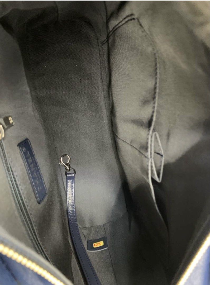 Chanel Gabriel Hobo Navy Medium (Negotiable) (Category: Bags & Wallets) located in Kuala Lumpur. Submitted by drcy2044 (Listing ID 1433901752, Image 3). Description: Never used, still with tag, but due to long storage since 2020, the bag has some signs of ageing. The leather part of the strap had peeling, I have sent to a third-party bag repairer to replace the leather (invoice for this can be provided upon request). There are multiple dent marks