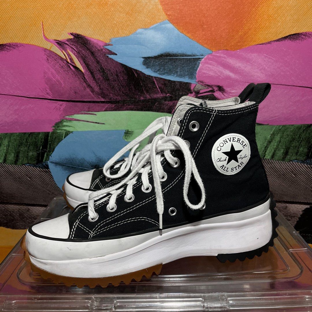 Converse Chuck Taylor Run Star Hike Black (Category: Sneakers) located in Leyte. Submitted by shoptastic_ph (Listing ID 1433972258, Image 1). Description: - Converse Run Star Hike sneakers - Color: Black - Features a platform sole with a star design on the heel - White laces - Iconic Converse All Star logo - Size indicated on inner label - Made in Vietnam.